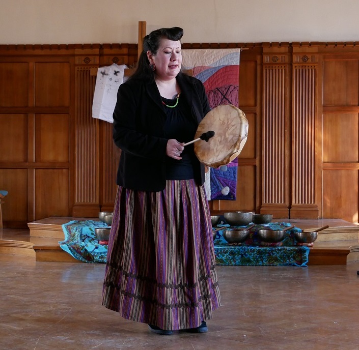 Jenny Blackbird drumming at Emmanuel College Colloquium March 2020