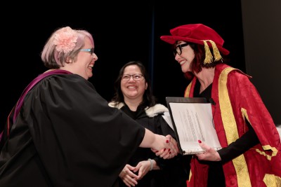 Emmanuel Student receiving diploma