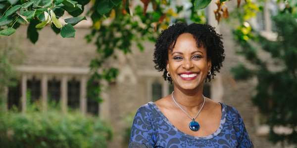 An image is depicted, showing a screenshot of a Toronto Star web article titled 'Academic papers written by AI get a solid B — but is it cheating?' The article's headline appears in bold font above a photograph of Rhonda McEwen, President of the International Association of Communication and Media Researchers. The photo shows McEwen wearing a blue dress.